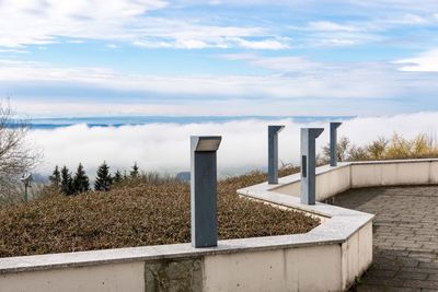 View of railing against cloudscape