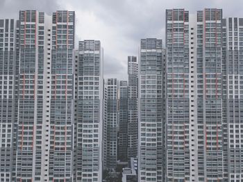 Low angle view of skyscrapers against sky