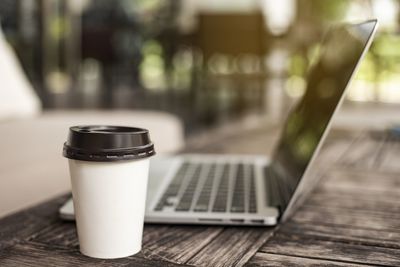 Close-up of coffee cup on table
