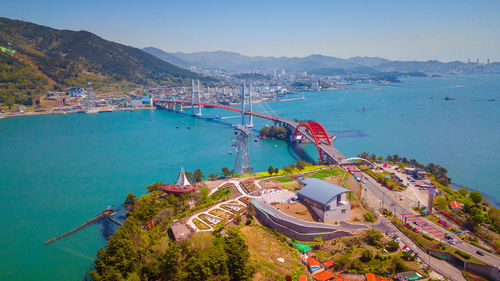 High angle view of boats in sea against sky