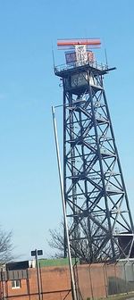 Low angle view of built structure against clear blue sky