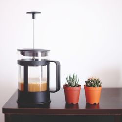 Close-up of potted plants on table