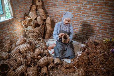 High angle view of woman standing in nest