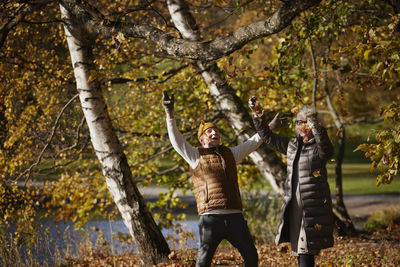 Senior couple in autumn scenery