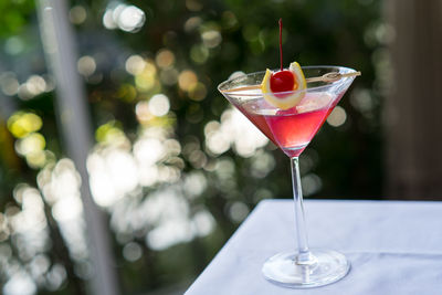 Close-up of wineglass on table