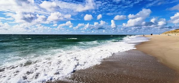 Panoramic view of beach against sky