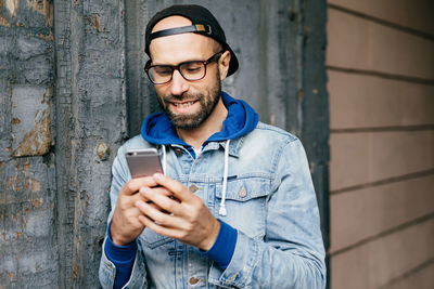 Young man using mobile phone