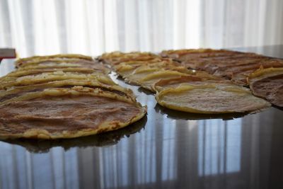 Close-up of bread in plate on table