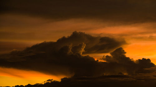 Scenic view of dramatic sky during sunset