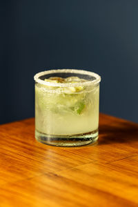 Close-up of beer glass on table