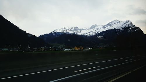 Road leading towards mountains