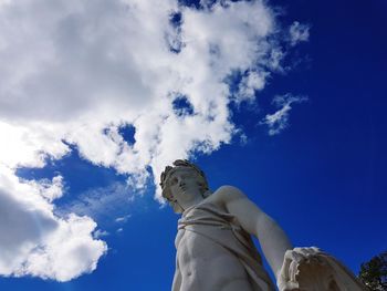 Low angle view of statue against sky