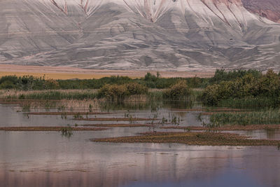 Scenic view of lake against mountain