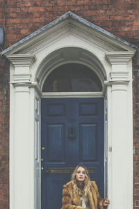 People in front of historic building