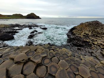 Scenic view of sea against sky - giant's causeway