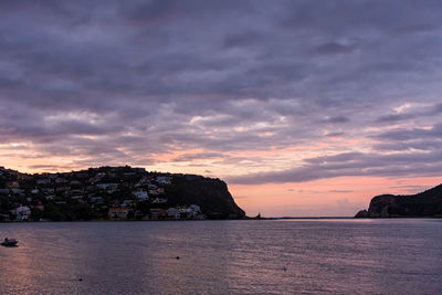 Scenic view of sea against sky at sunset