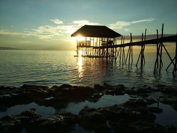 Scenic view of sea against sky at sunset