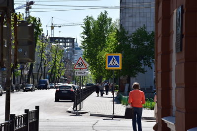 Woman standing in city