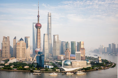 High angle shot of cityscape against clear sky