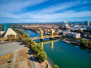 High angle view of river amidst buildings in city