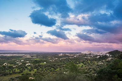 Aerial view of townscape against sky