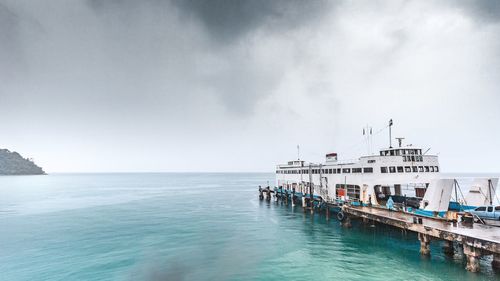 Pier over sea against sky