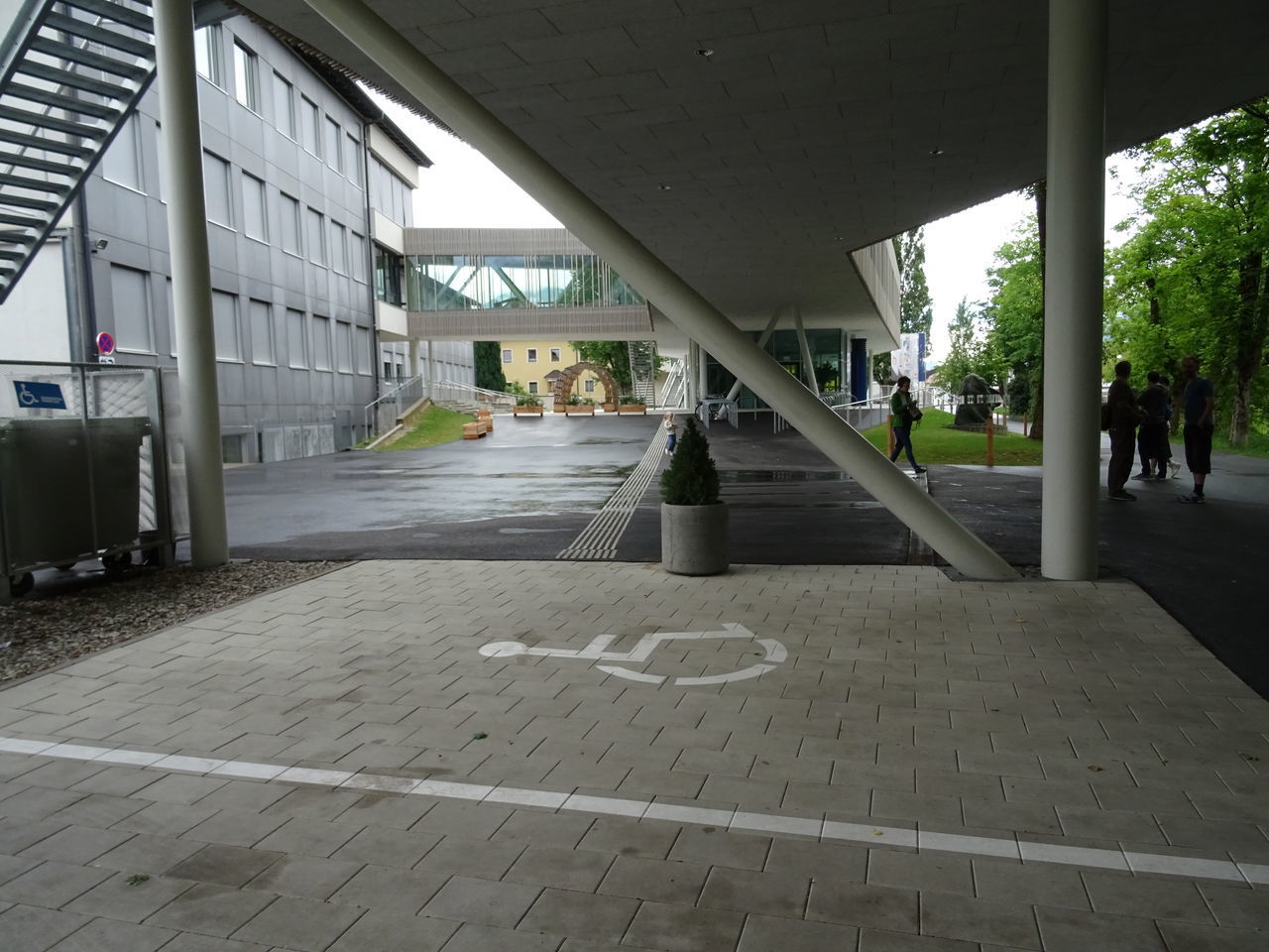 EMPTY FOOTPATH AMIDST BUILDINGS