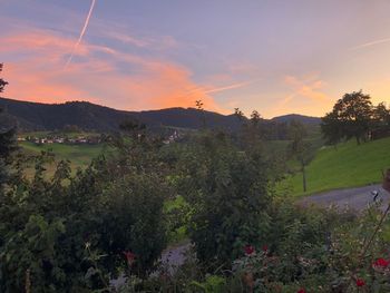 Scenic view of mountains against sky during sunset