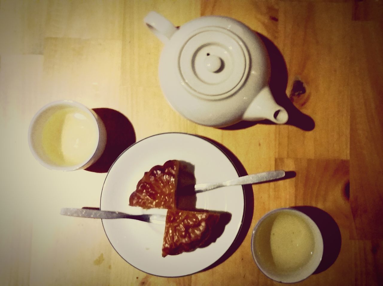 indoors, food and drink, table, freshness, food, still life, plate, spoon, drink, coffee cup, high angle view, fork, refreshment, directly above, ready-to-eat, coffee - drink, breakfast, healthy eating, saucer, sweet food