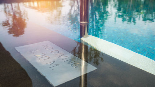 High angle view of text on swimming pool