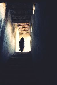 People walking in tunnel