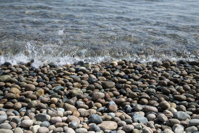 High angle view of stones on beach