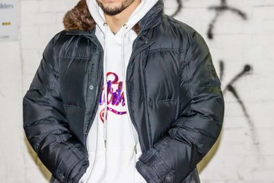 Midsection of man wearing jacket