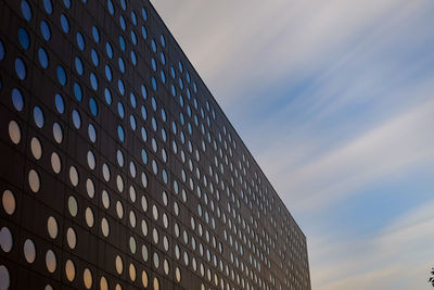 Low angle view of modern building against sky