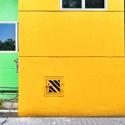 Close-up of yellow building