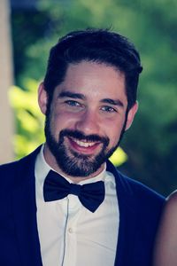 Portrait of smiling mid adult man wearing suit