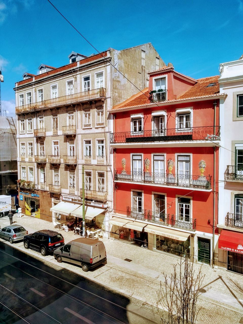 VIEW OF RESIDENTIAL BUILDINGS AGAINST SKY