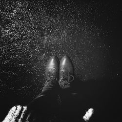 Low section of person standing on ground