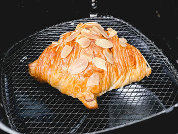 High angle view of fish on barbecue grill