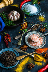 High angle view of spices and seasonings on table