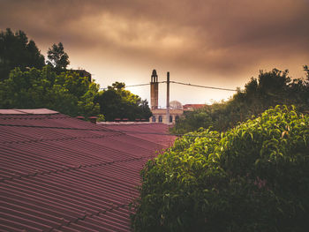 Building against cloudy sky in city