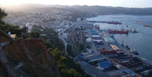 High angle view of town by sea