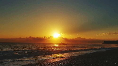 Scenic view of sunset over sea