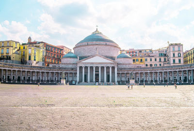 Facade of historic building against sky