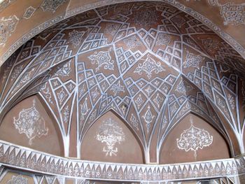 Low angle view of ornate ceiling in historic building