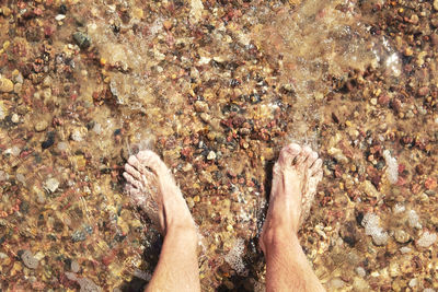 Feet in water