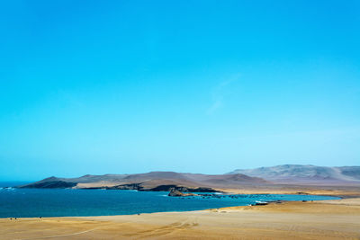 Calm lake along countryside landscape