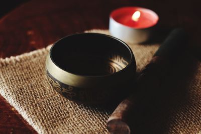 High angle view of tea light candle on table