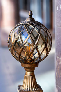 Close-up of electric lamp on table