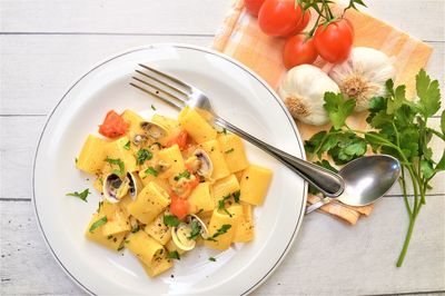 High angle view of fruits in plate on table